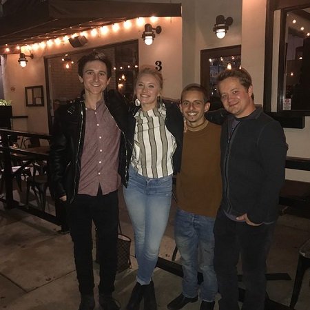 Moises Arias (second right) with his co-stars Emily Osment (second left), Jason Earles (right) and Mitchel Musso (left) in a reunited moment.