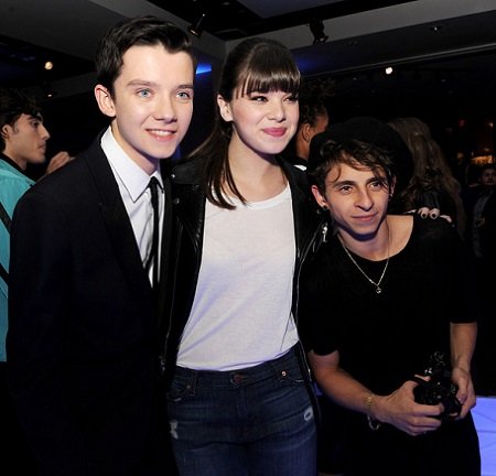 (L-R) Actors Asa Butterfield, Hailee Steinfeld and Moises Arias pose at the after party for the premiere of Summit Entertainment's 'Ender's Game' at The Annix on October 28, 2013 in Los Angeles, California.