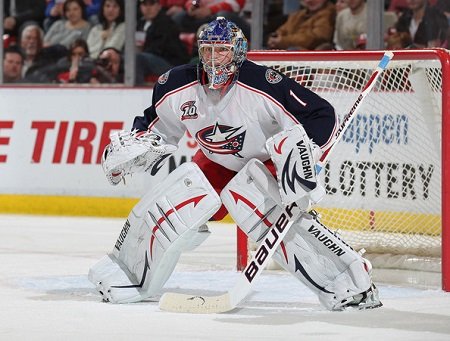 Steve Mason #1 of the Columbus Blue Jackets gets set to face one of the shots in a shut-out against the Detroit Red Wings on February 4, 2011 at the Joe Louis Arena in Detroit, Michigan. The Blue Jackets defeated the Wings 3-0. (Feb. 3, 2011 - Source: Claus Andersen/Getty Images North America)