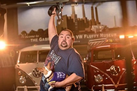 Comedian Gabriel ÒFluffyÓ Iglesias with his Chihuahuas, Risa, left, and Vinnie, at his compound in Signal Hill, California, on Monday, Dec 18, 2017. Iglesias has a classic VW bus collection along with studio and a warehouse for his merchandise at The Fluffy Compound.