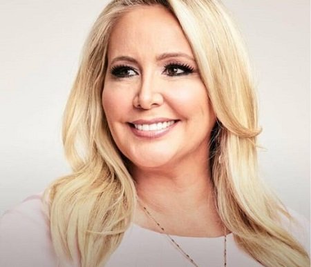Shannon Beador's portrait photo of her smiling. She has a net worth of $10 million.