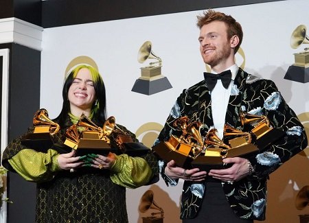 Billie Eilish with brother Finneas O'Connell with five Grammys each.