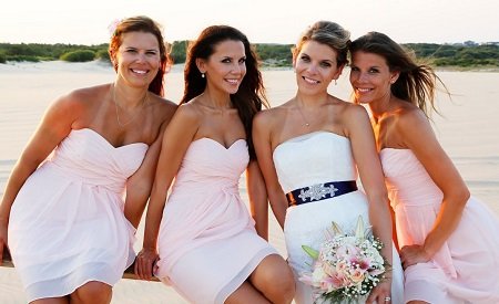 Tati Westbrook and her three sisters during Erik's wedding.