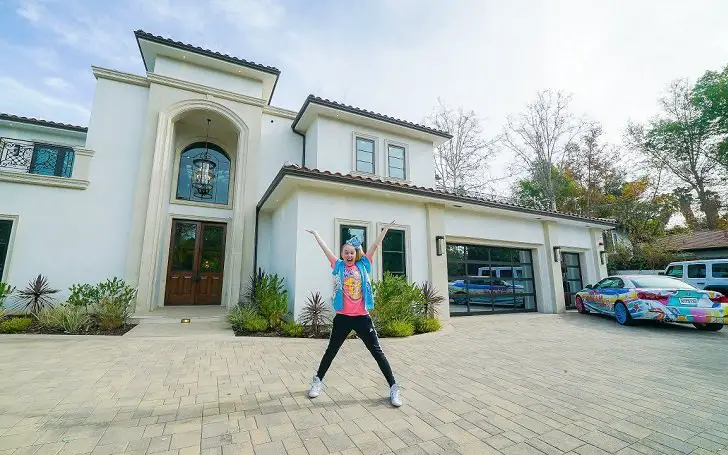 JoJo Siwa in front of her house.
