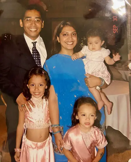 A young Avani Gregg with her biracial parents and her two sister.