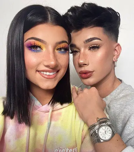 Charli D'Amelio with James Charles with her makeup on.
