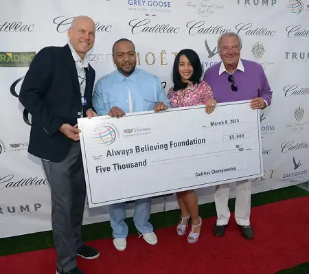 (L-R) David Pillsbury,Timbaland, Monique Mosley and Butch Buchholz attend GREY GOOSE Vodka and the Cadillac Championship Toast Travie McCoy at the Trump National Doral on March 8, 2014 in Doral, Florida.