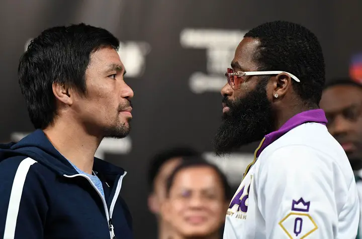  WBA welterweight champion Manny Pacquiao (L) and Adrien Broner face off during a news conference at MGM Grand Hotel & Casino on January 16, 2019 in Las Vegas, Nevada. Pacquiao will defend his title against Broner on January 19 at MGM Grand Garden Arena in Las Vegas.