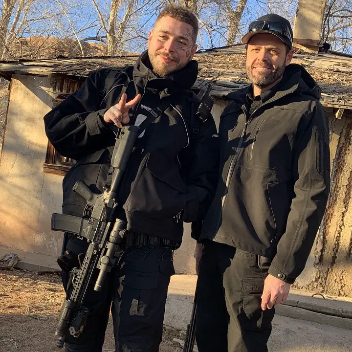Bryant Arnold (right) with Post Malone (left) during the singer's visit to the Skinwalker Ranch.