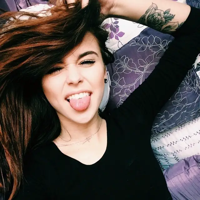 Acacia Kersey in her classic Tumblr post with a few tattoos.