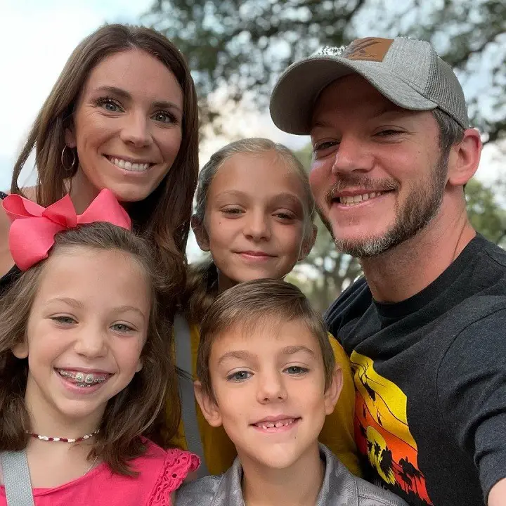 YouTuber Matt Carriker (right), aka Demolition Man, with his wife (left) and two kids.