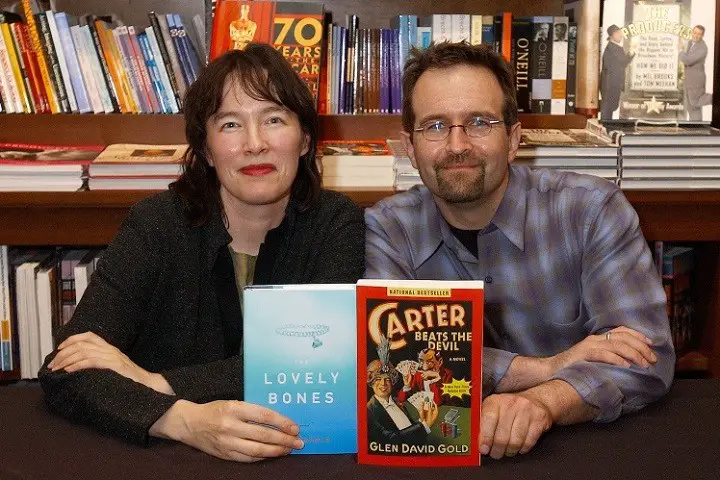 Alice Sebold, author of "The Lovely Bones", & husband Glen David Gold, author of "Carter Beats the Devil", pose with their books at Book Soup South Coast Plaza.