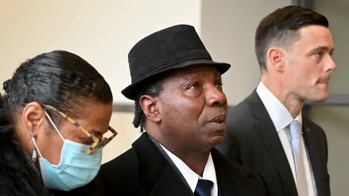 Anthony Broadwater, centre, gazes upward on Nov. 22, 2021, in Syracuse, N.Y., after Judge Gordon Cuffy overturned the 40-year-old rape conviction that wrongfully put him in state prison for Alice Sebold's rape.