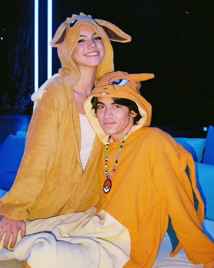 Zack Lugo (right) and girlfriend Emma Brooks McAllister (left) both in their Pokemon's Charizard costumes.