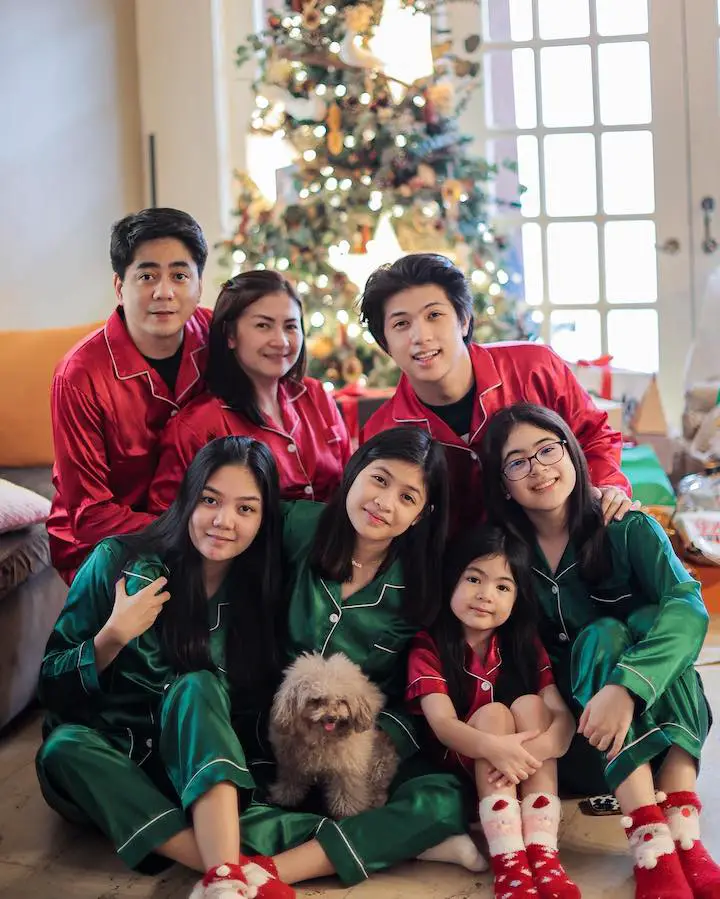 Ranz Kyle (top right) with his entire family, including his mother (top center) and step-father (top left).