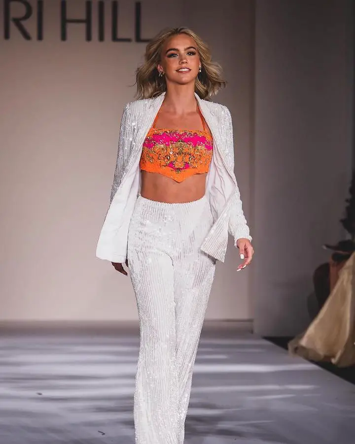 Emma Brooks McAllister on the runway at the New York Fashion Week for Sherri Hill in September 2021.