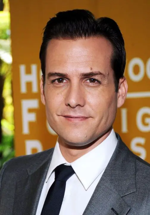 Gabriel Macht's scar and lip create an enigmatic allure in his portrayal of Harvey Specter on "Suits. celebsfortune.com