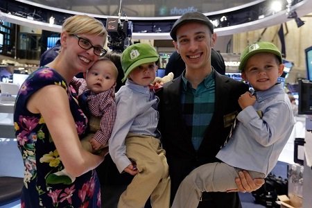 'Shopify Inc.' CEO Tobias Lutke and wife Fiona McKean, pose with their children: Fraser, Sam and Tristan, left to right, on the floor of the New York Stock Exchange, before the company's IPO, Thursday, May 21, 2015.