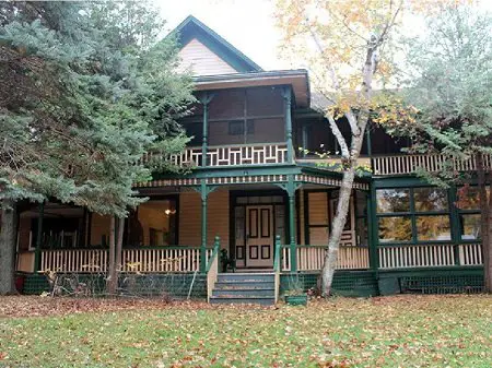 The Lutke Family restored the gone-under Opinicon Resort. The front of the resort is shown.