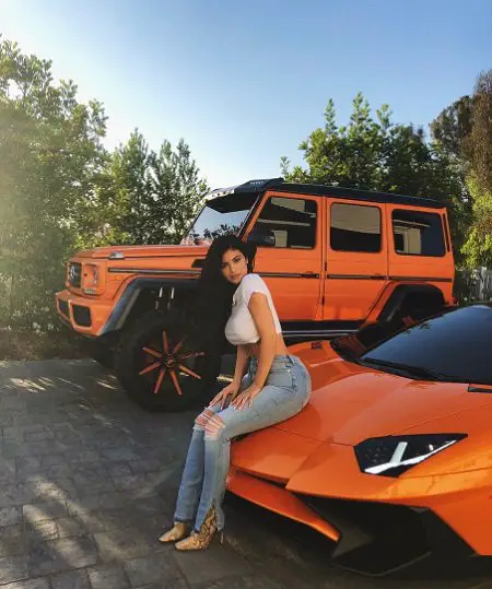 Kylie Jenner in her Lamborghini Aventador.