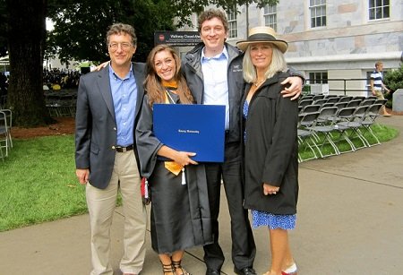 Marty Lagina (left) with his family, wife (right) and two kids (center).