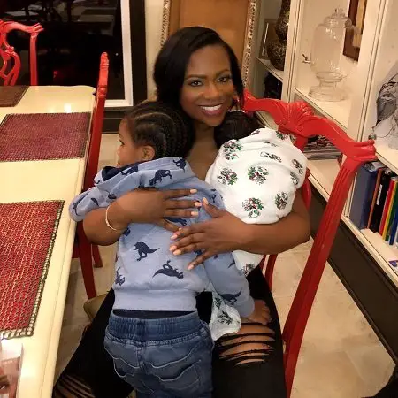 Kandi Burruss with her older son and her newborn.