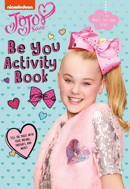 JoJo Siwa on the cover of one of her books.