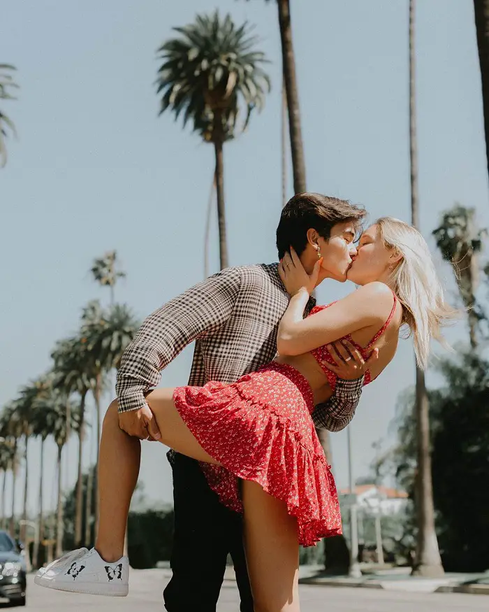 Olivia Ponton kissing boyfriend Kio Cyr in a romantic pose.