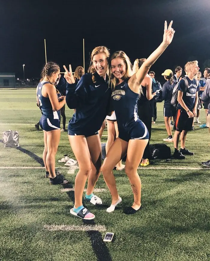 Olivia Ponton and her friend celebrating a school sporting event.