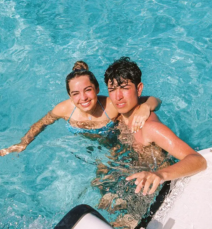 Addison Rae and Sebastian Topete in the pool.