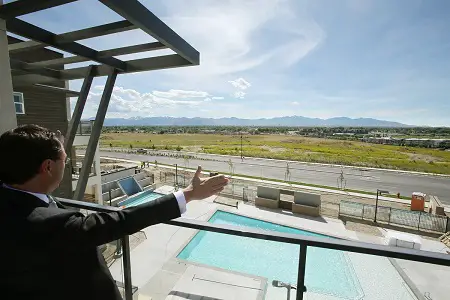 Brandon Fugal, Colliers International chairman, points out the spot of ground that Zion Bancorporation plans to build a technology campus at the former Sharon Steel Mill site in Midvale on Wednesday, May 27, 2020. The land near the Jordan River at 7800 South and Bingham Junction Boulevard was once an EPA Superfund site and has since been cleaned up.