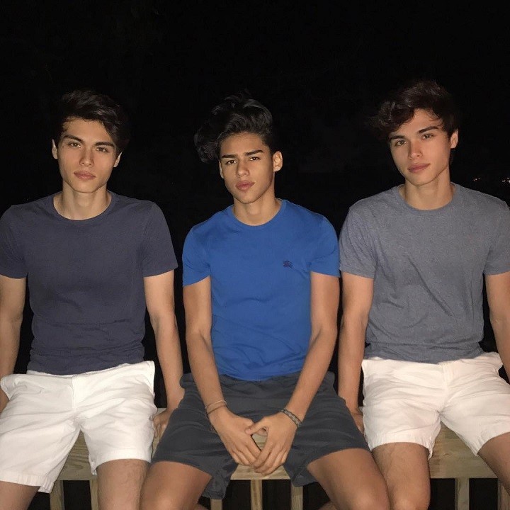 Andrew Davila (center) with the Stoke Twins, Alex (left) and Alan (right).