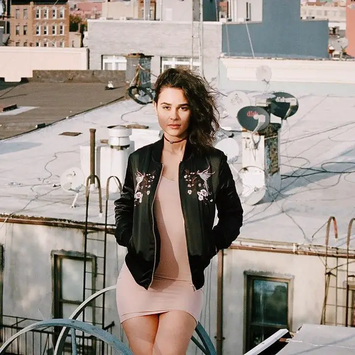 Marianly Tejada posing on a rooftop.