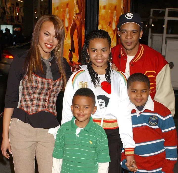 Faith Evans (far left) with her ex-husband Todd Russaw (far right) with their children Joshua, Chyna and Christopher.