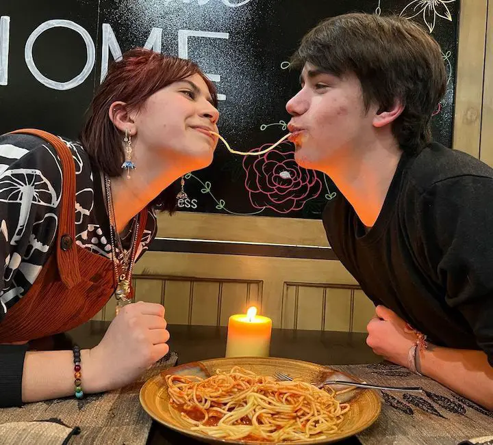The iconic two people on two ends of a sphagetti strand pose for Ethan Fineshriber (right) and his girlfriend Chloe (left).
