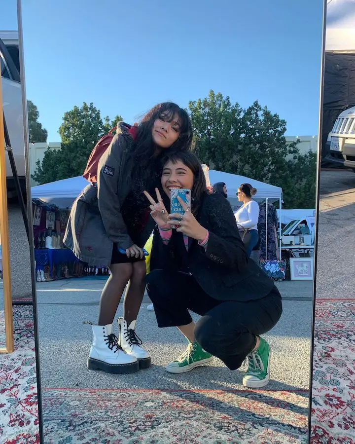 Momona Tamada (left) in midst of enjoying her day with Xochitl Gomez (right) taking their selfie mirror.