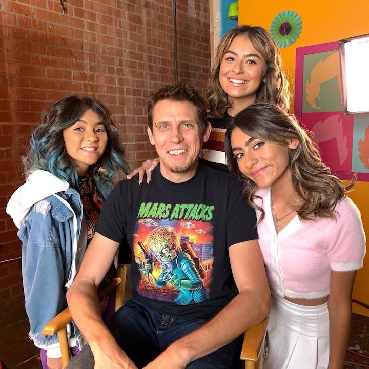 The GEM Sisters Evangeline Lomelino (left), Giselle Lomelino (top), and Mercedes Lomelino (right) with their adoptive father Ryun Hovind (center).