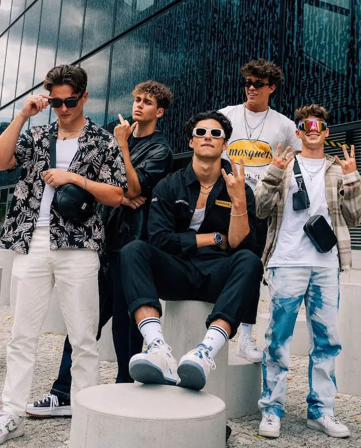 (L-R) Elevator Boys members Luis Freitag, Bene Schulz, Jacob Rott, Tim Schaecker, and Julien Brown making weird poses with different glasses.