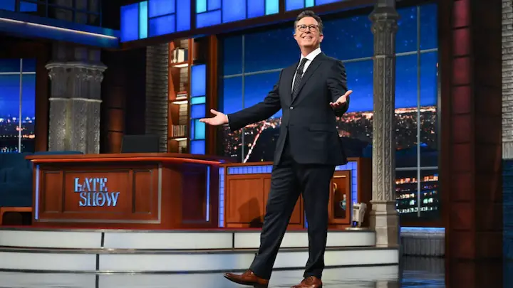Stephen Colbert, who has a sickness called Benign Positional Vertigo, entering his set during one of his monologues on "The Late Show with Stephen Colbert".