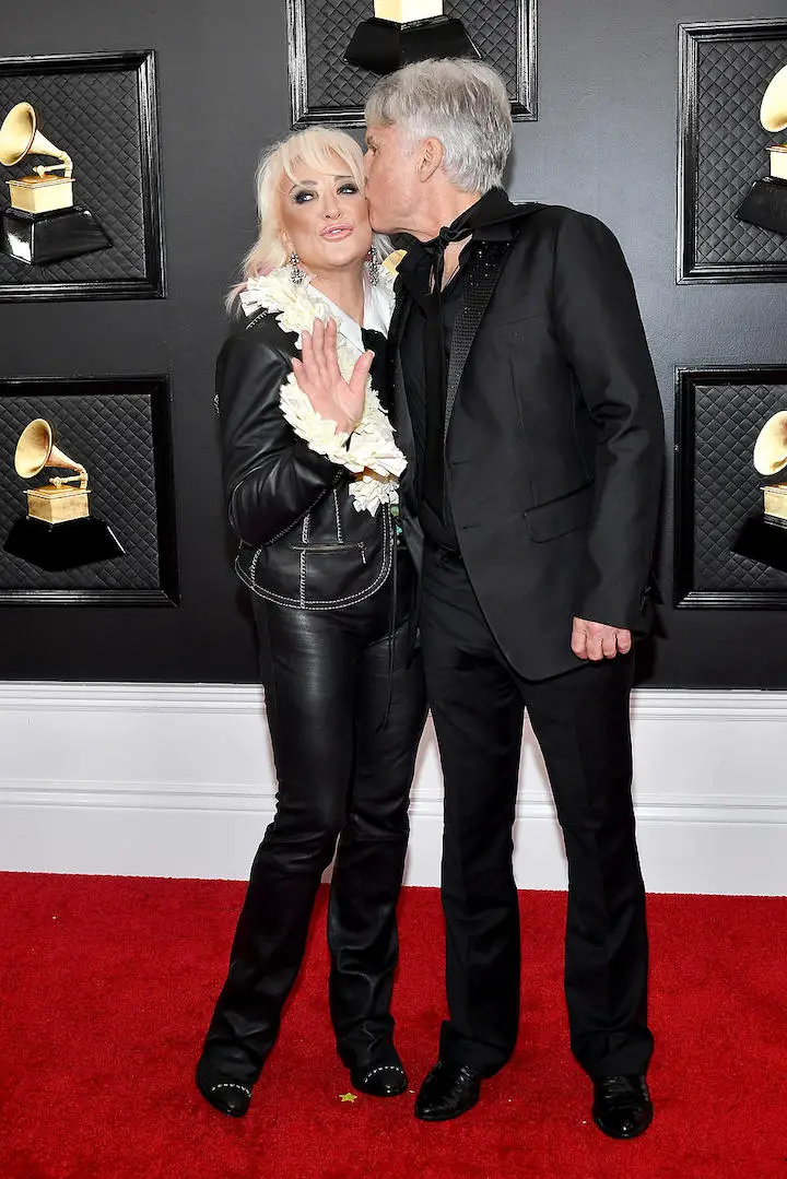LOS ANGELES, CALIFORNIA - JANUARY 26: (L-R) Tanya Tucker and Craig Dillingham attend the 62nd Annual GRAMMY Awards at Staples Center on January 26, 2020 in Los Angeles, California.