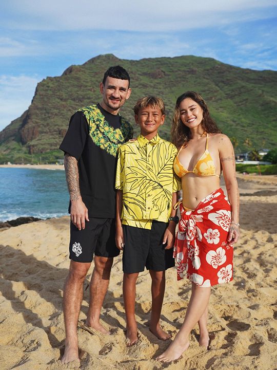 Max Holloway with his wife and son.
